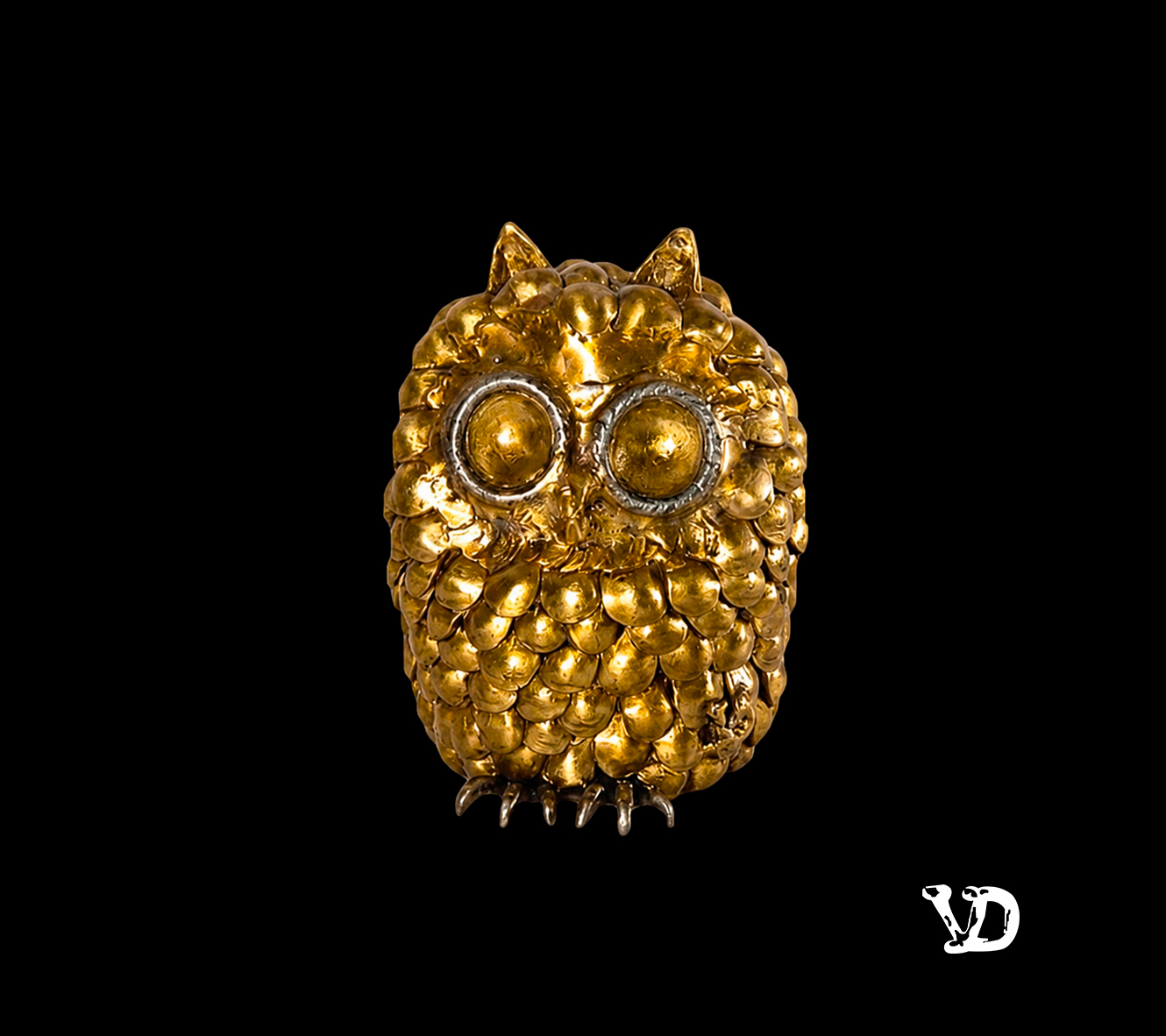búho de oro